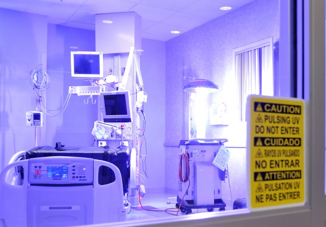 L-VIRA, a germ-zapping robot, emits a flash of ultraviolet c (UVC) light for disinfection of an Intensive Care Unit hospital room at William Beaumont Army Medical Center (Photo Credit: U.S. Army).