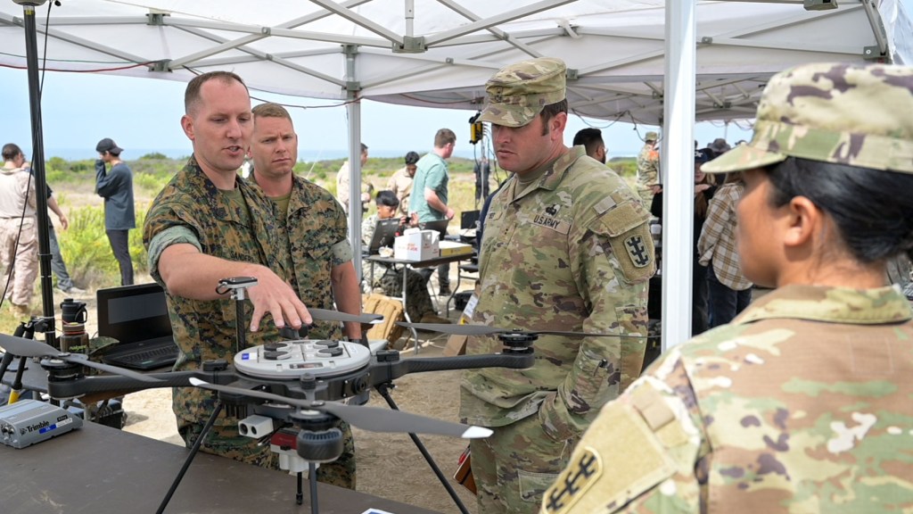 Marines discussing unmanned vehicle