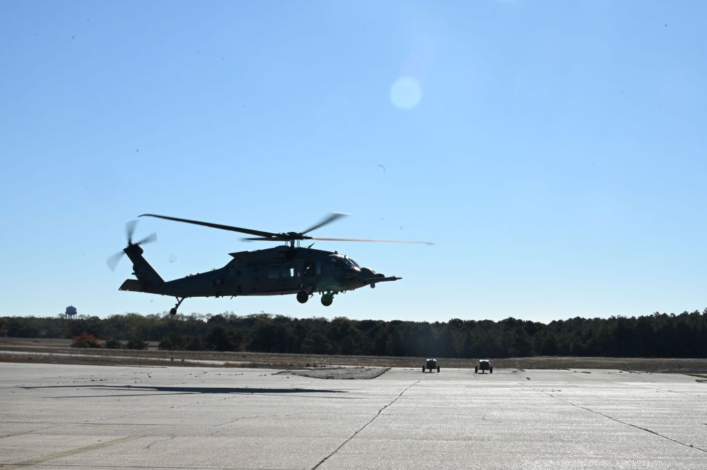 An HH-60W Jolly Green II search and rescue helicopter assigned to the 106th Rescue Wing conducts a flyover during an HH-60W conversion ceremony at the 106th Rescue Wing at Francis S. Gabreski Air National Guard Base, Westhampton Beach, N.Y., Oct. 25, 2024. The ceremony celebrated the official conversion of the 106th from the HH-60G Pave Hawk search and rescue helicopter to the HH-60W Jolly Green II. (U.S. Air Force photo)