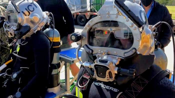 U.S. Navy divers test the Divers Augmented Vision Display (DAVD) during a training exercise in Little Creek, Virginia. Outfitted with components such as a heads-up display resembling virtual-reality glasses (which can be adapted to any Navy dive helmet), DAVD enables divers to better operate in inhospitable underwater environments. (Photo courtesy of Coda Octopus)