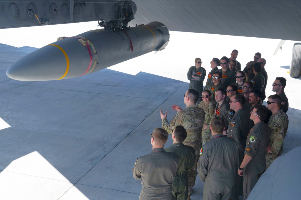 B-52 Stratofortress crews from the 23rd Expeditionary Bomb Squadron, Minot Air Force Base, North Dakota and the 49th Test and Evaluation Squadron, Barksdale Air Force Base, Louisiana, participated in hypersonic weapon familiarization training at Andersen Air Force Base, Guam, Feb. 27, 2024. The Department of Defense is developing hypersonic science and technology to ensure the U.S. can rapidly transition operational hypersonic systems. (U.S. Air Force photo by Staff Sgt. Pedro Tenorio)