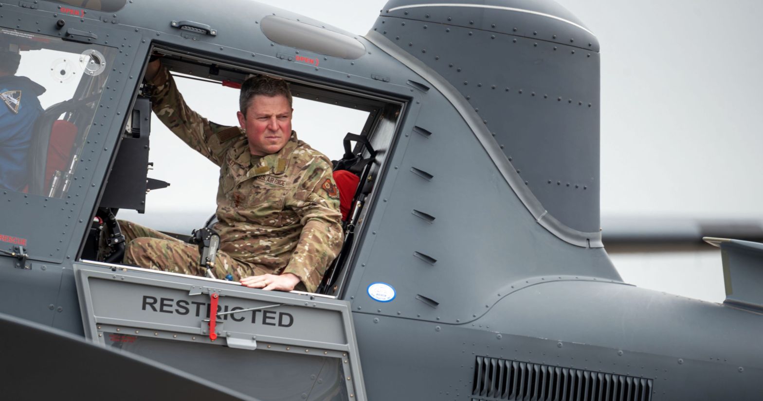 U.S. Air Force Lt. Gen. Michael Conley, Air Force Special Operations Command commander, steps from the OA-1K Skyraider II as part of a delivery ceremony at Hurlburt Field, Florida, April 3, 2025. The ceremony recognized the delivery of the first missionized OA-1K Skyraider II to AFSOC. (U.S. Air Force photo by Staff Sgt. Natalie Fiorilli)