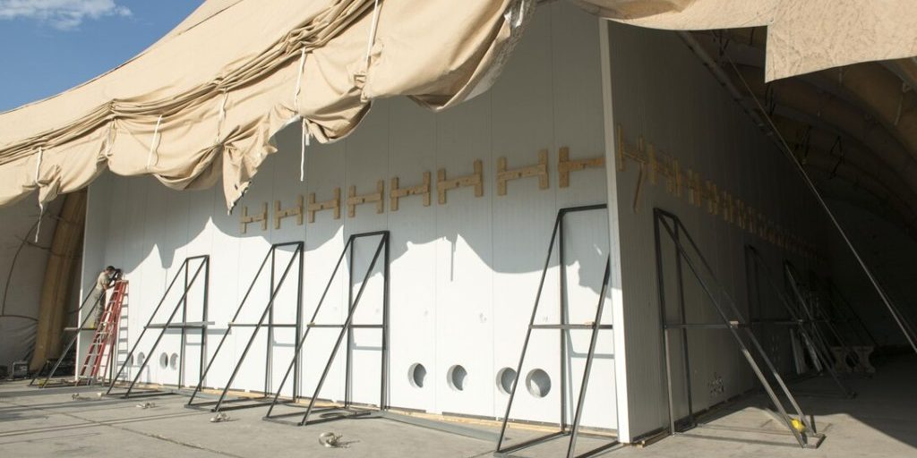 An aircraft enclosure of the decontamination facility being built for upcoming chemical and biological decontamination tests on the F-35 Joint Strike Fighter (U.S. Air Force photo by Brad White).