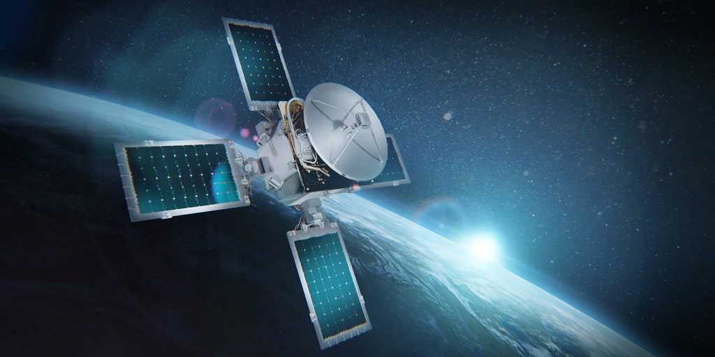 image of a satellite in space over Earth