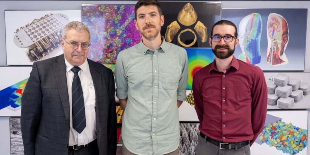 Alexander Efros (left), Ph.D., U.S. Naval Research Laboratory (NRL) senior scientist; John Lyons (center), Ph.D., NRL physical scientist; and Michael Swift, Ph.D., NRL research physicist, gather for a group photo in the Materials Science and Technology facility in Washington, D.C., July 25, 2024. The team performs basic and applied research on functional, structural, and electronic materials systems. (U.S. Navy photo by Sarah Peterson)