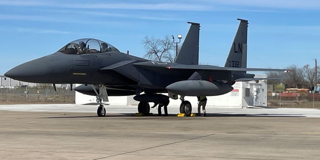 An F-15E Strike Eagle sits on a flightline in San Antonio, Texas, Jan. 15, 2025. The aircraft was recently upgraded with Eagle Passive/Active Warning and Survivability System, advanced electronic warfare system. (Boeing courtesy photo)