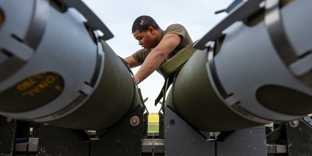 An Airman assigned to the 393rd Bomber Generation Squadron prepares GBU-38 Joint Direct Attack Munitions to be loaded onto a B-2 Spirit stealth bomber at Whiteman Air Force Base, Mo. The loading operations were a component of the Air Force Research Laboratory QUICKSINK Joint Capability Technology Demonstration, a new low-cost, air-delivered capability for defeating maritime threats. (U.S. Air Force photo by Senior Airman Joshua Hastings)