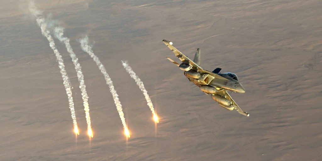 A U.S. Navy EA-18G Growler fires flares during an Operation Inherent Resolve mission over the U.S. Central Command area of responsibility, Dec. 24, 2024. The Growlers are part of the USS Harry S. Truman Carrier Strike Group and are deployed in support of maritime security operations and theater security cooperation efforts in the CENTCOM AOR. (U.S. Air Force photo by Staff Sgt. Gerald R. Willis)