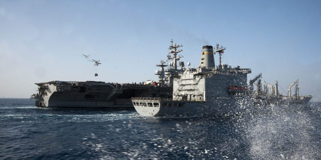 Aircraft carrier USS Dwight D. Eisenhower (CVN 69) conducts a replenishment-at-sea alongside fleet replenishment oiler USNS Walter S. Diehl (T-AO 193). Hue City is deployed to the U.S. 5th Fleet area of responsibility promoting maritime security operations, theater security cooperation efforts and support missions as part of Operation Enduring Freedom. (U.S. Navy photo by Mass Communication Specialist 3rd Class Luis Fiallos/Released)