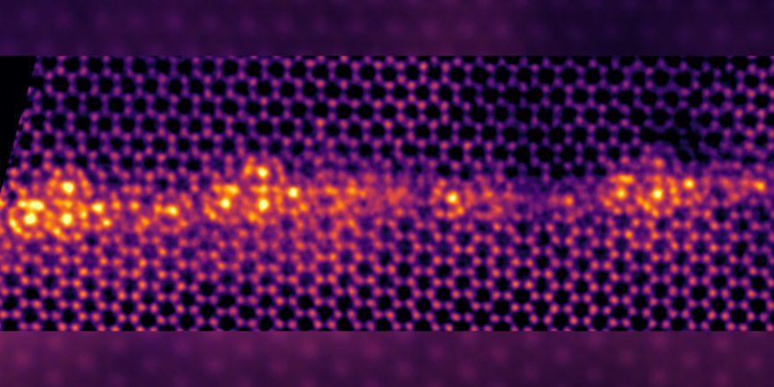 Using atomic-resolution scanning transmission electron microscopy, researchers found that in the presence of iron, the grain boundary of titanium undergoes a phase transition, forming “cages” or “clusters” at the grain boundary (the gold region at the center of the image). (Image courtesy of Tim Frolov/LLNL)