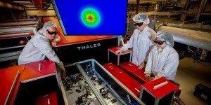 From left to right, Berkeley Lab researchers Anthony Gonsalves, Alessio Amodio, and Dan Wang align precision optics to prepare the Berkeley Lab Laser Accelerator (BELLA) Petawatt laser for laser-plasma accelerator (LPA) experiments. The machine learning–based control algorithm stabilizes the high-power laser’s pointing at the LPA target. (Credit: Thor Swift/Berkeley Lab)