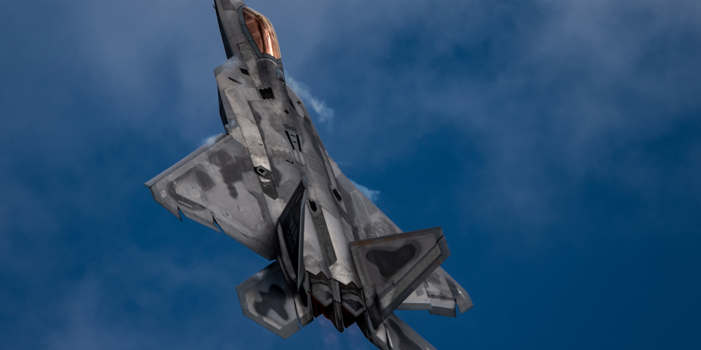 Graphic of an F-22 Aircraft flying.