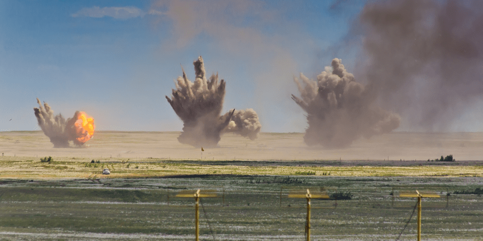 PNGoriginal (1) Image of multiple explosions on a range