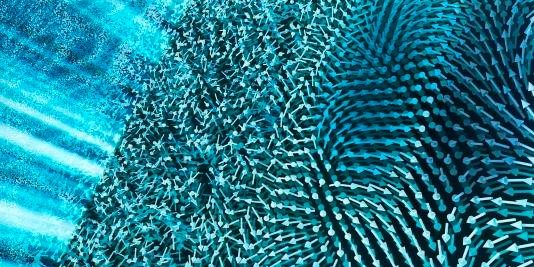 Illustration of the material’s transition, with time represented from left to right. A laser pulse (left) sends the material into disorder (middle). Out of this so-called soup phase emerges a highly ordered phase called a supercrystal (right). (Image by Argonne National Laboratory.)