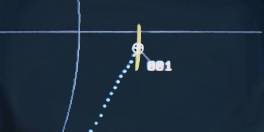 Detail of a radarscreen: the target in skin paint mode (amber) and as synthetic video (white). The blue dots are the targets history, the blue straight line is an azimuth mark, the blue sector of a circle is a range mark. The source of the sysnthetic symbol may be the plotextractor of the Primary radar and/or the replay of a transponder (secondary radar).