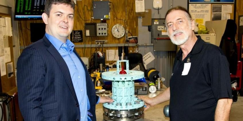 Left, Rocketstar's Chris Craddock, and right, TrailBlazer's Lee Wooldridge, with 3D printed throttleable pintle injector (source: 
 Rocketstar).