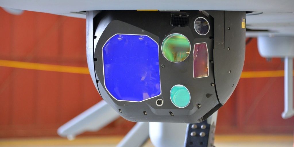 The Common Sensor Payload is the electro-optical/infrared/laser range designator sensor for battlefield commanders onboard the MQ-1C Gray Eagle uncrewed aircraft system. It provides real-time imagery for detection and classification of targets and threats for battlefield commanders with day and night imaging sensors, laser designation, pointing, target marking, and spot tracking for aerial intelligence. (U.S. Army Photo)